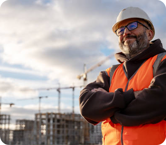 man standing in working vest